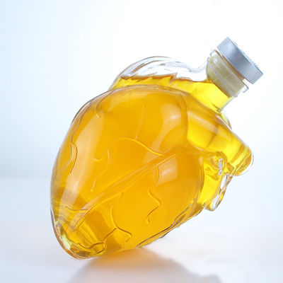 透明またはカスタマイズされた心臓形ガラス酒瓶 飲料のためのウイスキー ウォッカ ブランデー