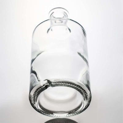 クリアまたはカスタマイズされた丸い形 750ml 1000ml ウイスキー用木のコルク付きガラスボトル