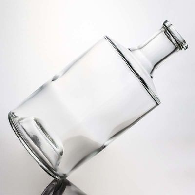クリアまたはカスタマイズされた丸い形 750ml 1000ml ウイスキー用木のコルク付きガラスボトル